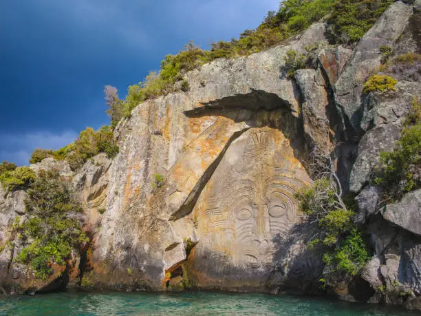 Photo of Mine Bay Maori Rock Carvings in Taupo, North Island, New Zealand