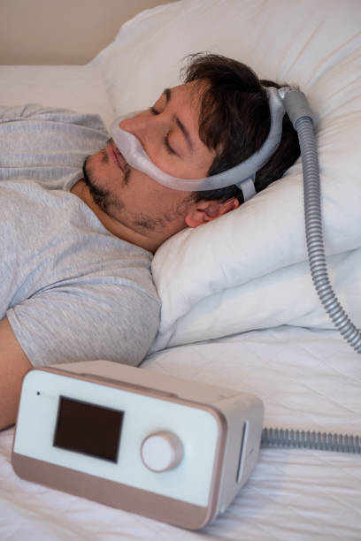istock man wearing under the nose nasal mask 1198871241