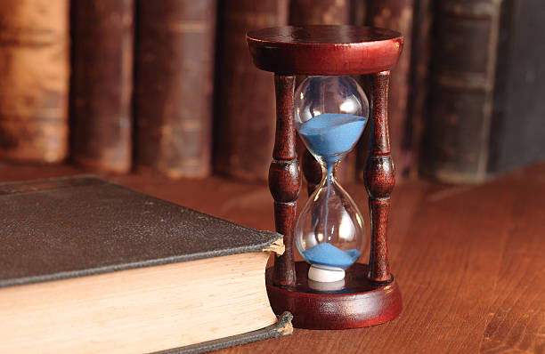 istock Hourglass And Old Books 119887412