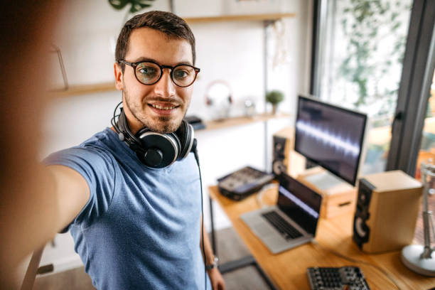 istock Dj taking selfie at home recording studio 1198876830