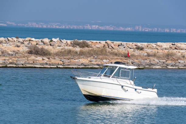 istock White boat on the blue sea 1198882636