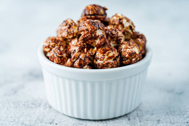 istock Chocolate caramel sweet Popcorn in a white bowl 1198885058