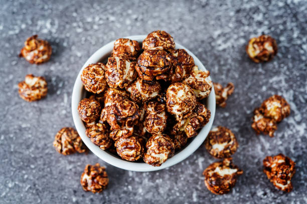 istock Chocolate caramel sweet Popcorn in a white bowl 1198885091