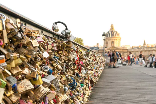 For years people have been putting locks on bridge railing as a symbols of their affection.