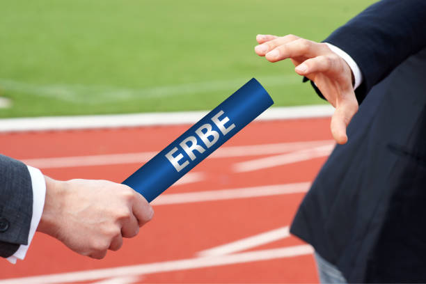 istock Businessman Passing Relay Baton with German word 