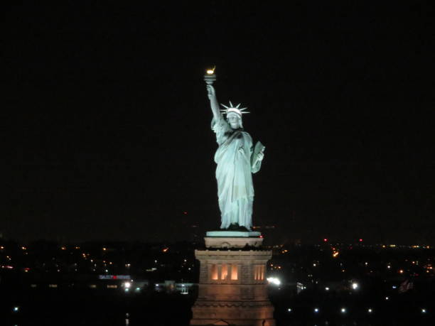 istock Statue of Liberty at Night 1198900994