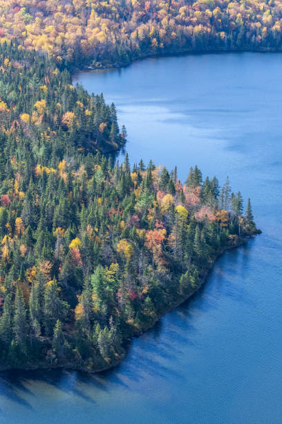 istock Canada, panorama of a mountain lake 1198903023