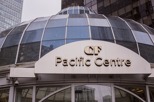 Vancouver, Canada - December 21, 2019. A sign for the entrance to Pacific Centre, a fancier shopping mall in downtown Vancouver.