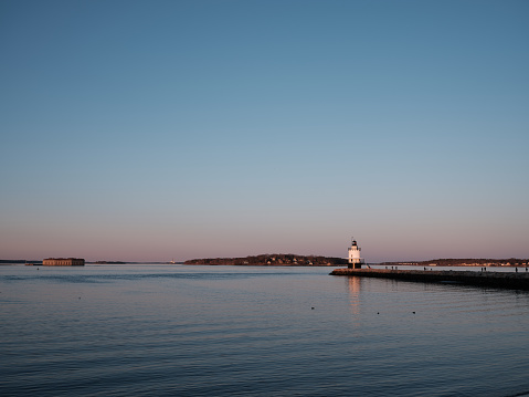 Sunset at the Spring Ledge Lighthouse on Casco Bay in South Portland Maine