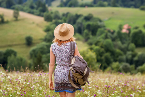 istock woman hiker enjoy the view at mountain 1198908889