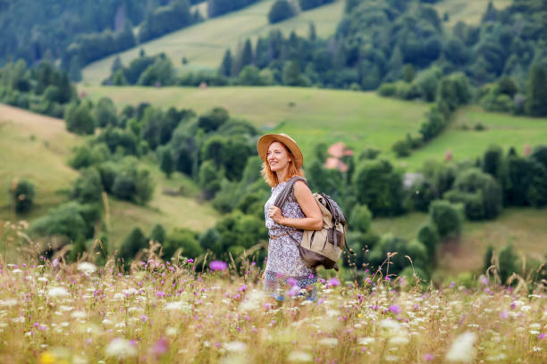 istock woman hiker enjoy the view at mountain 1198908906