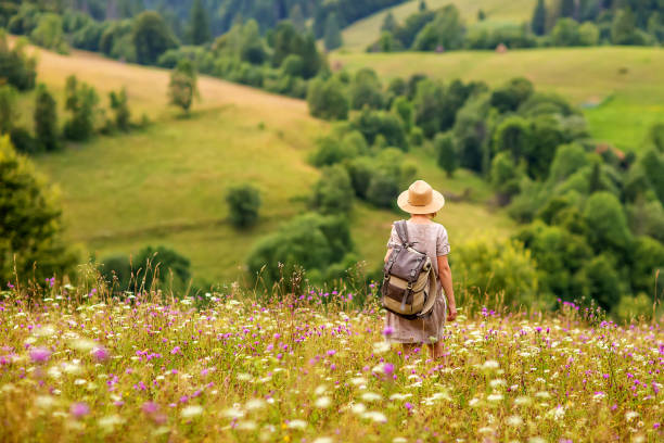 istock woman hiker enjoy the view at mountain 1198910370