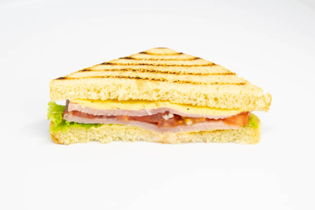 istock Sandwich with ham, cheese, tomatoes, lettuce, and toasted bread 1198910450