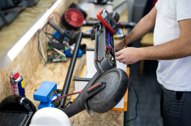 istock Repair of electronic devices. Microelectronics engineering and technology concept. Electric scooter service 1198918036