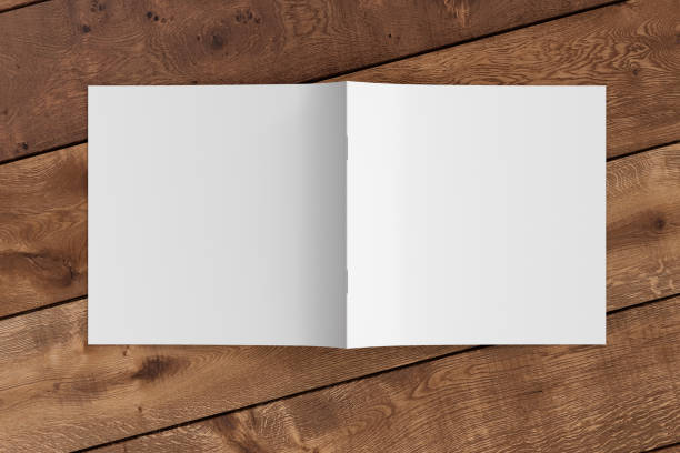istock Square brochure or booklet cover. Brochure is open and upside down. 1198924539