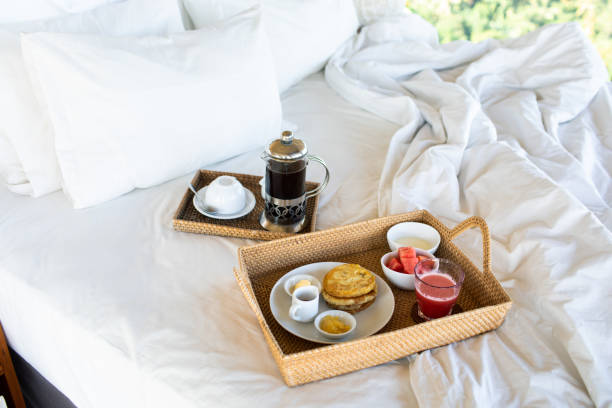 istock Breakfast in bed with coffee and  pancakes. 1198926237