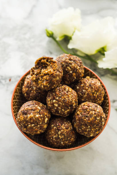 istock Energy balls with healthy ingredients on marble 1198926244