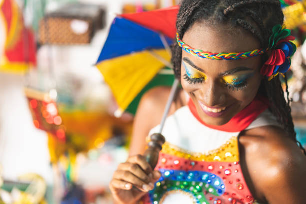 istock Afro artist holding a frevo umbrella 1198931184