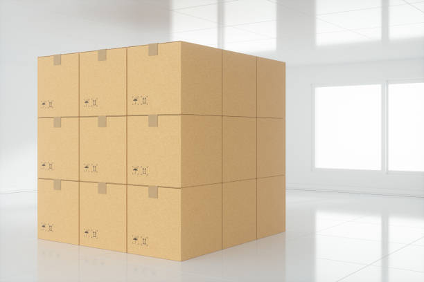 istock Stacked cardboard in the empty room, with sunlight come from the windows, 3d rendering. 1198933248