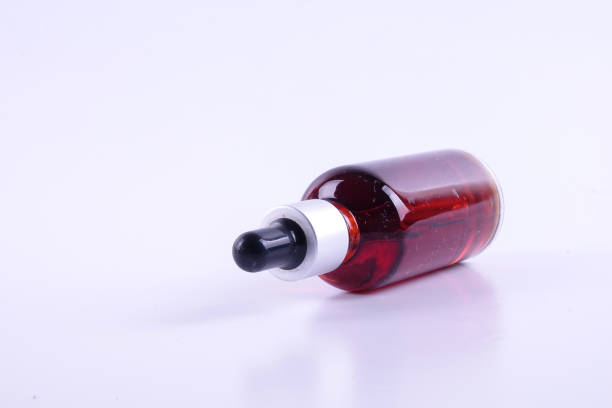 istock Nigella sativa or Black cumin oil over white background. 1198934942