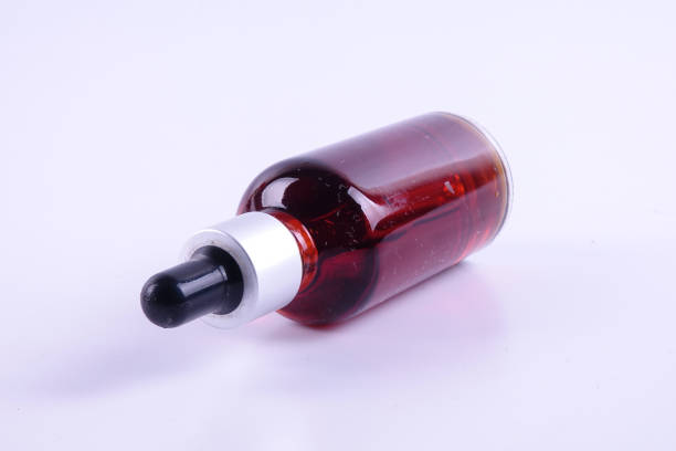 istock Nigella sativa or Black cumin oil over white background. 1198934946