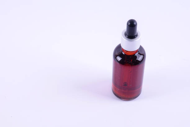istock Nigella sativa or Black cumin oil over white background. 1198934950