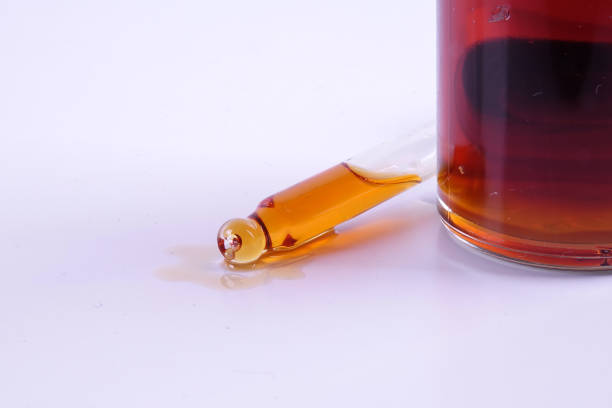 istock Nigella sativa or Black cumin oil over white background. 1198934952