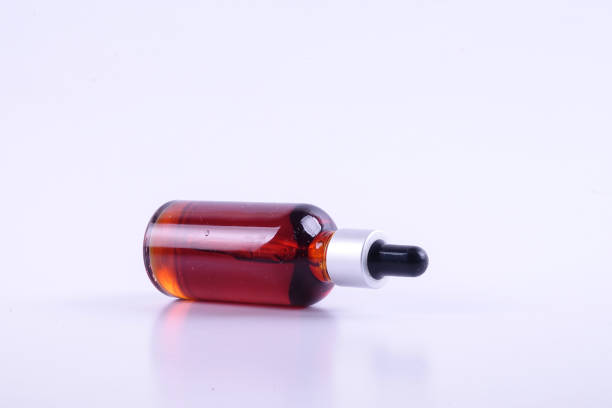 istock Nigella sativa or Black cumin oil over white background. 1198934957