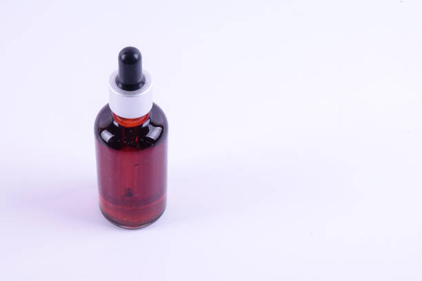 istock Nigella sativa or Black cumin oil over white background. 1198934963