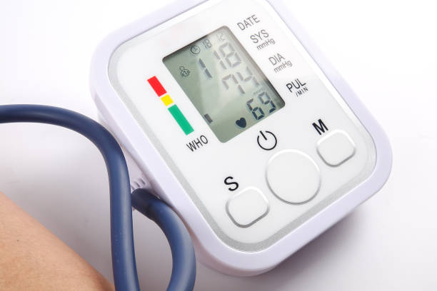 istock Male checking blood pressure on white background 1198937462