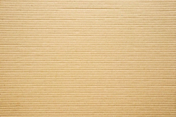 istock Old brown recycled eco paper texture cardboard background 1198945369