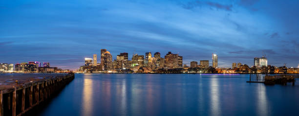istock Long Exposure Panorama of Boston Skyline With Boat Light Trails 1198947741