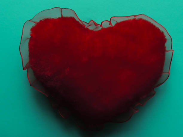 istock Red heart on a color background. 1198951168