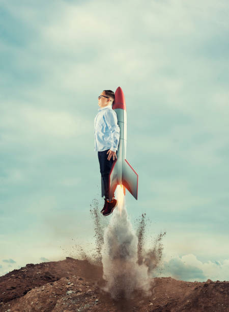 istock Young businessman take off with a rocket. Launch start up business concept. 1198952231
