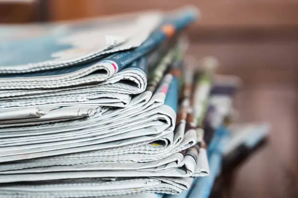 Photo of Stack of Newspapers, Journalism concept