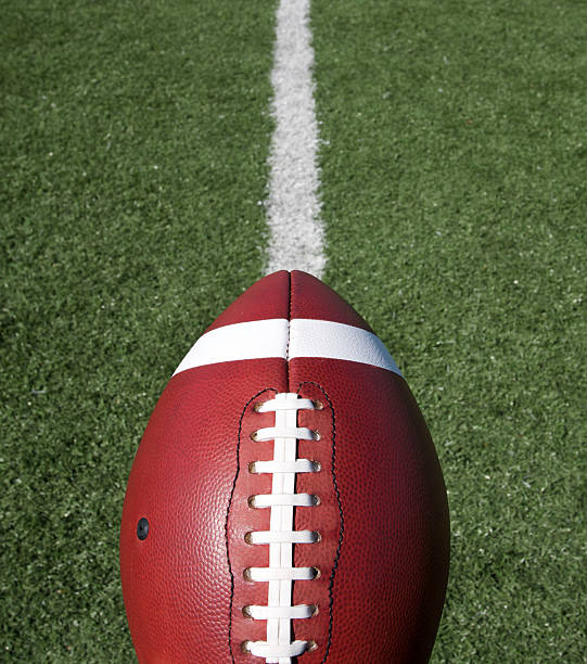 istock Football with Field Beyond 119896038