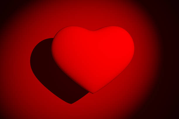 Red heart in spotlight on red background, 3D rendering
