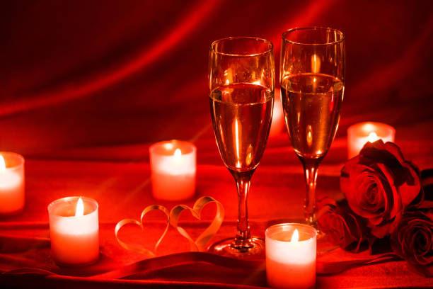 istock Champagne glasses and candles 1198962681