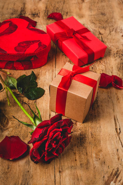 istock Composition of red roses and gift boxes 1198965877