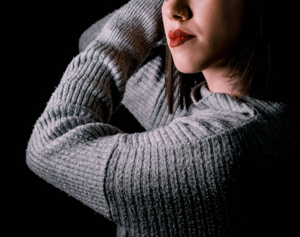 istock womans tongue teeth lips 1198966798