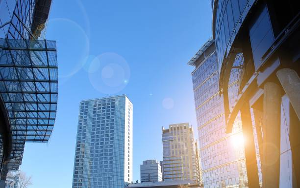 istock Sun rays light effects on urban buildings in sunset. 1198968235