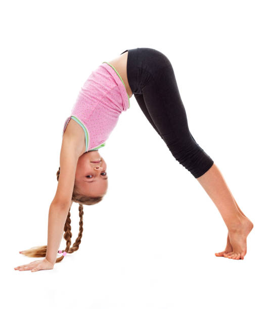 istock Young girl doing gymnastic floor exercises 1198972744