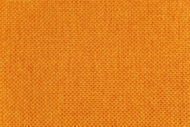 istock Orange fabric texture background, close-up 1198973760