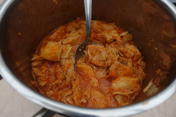 istock Tripe with tomato sauce during cooking  French cooking 1198974982