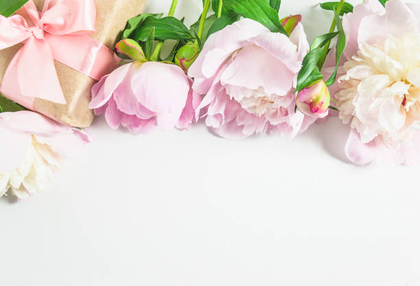 istock Romantic greeting card with pink peonies and handmade gift box 1198977206