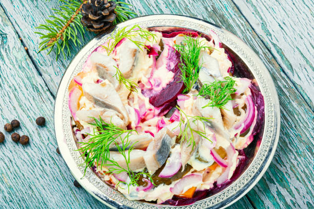 Appetizing salad with herring and vegetables.Seafood salad.Traditional Ukrainian salad.