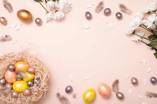 Gift card with colorful easter eggs on pink background for banner design. Beautiful spring card. Happy easter concept.