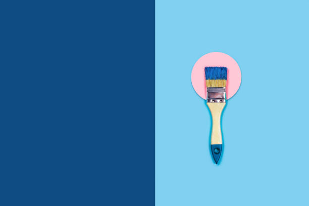 istock Two toned background with paint brush. 1198981556