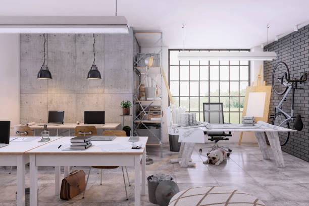istock Small contemporary office interior with large office desk 1198981736