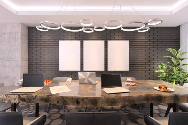 istock Modern small office interior with large conference desk 1198981761